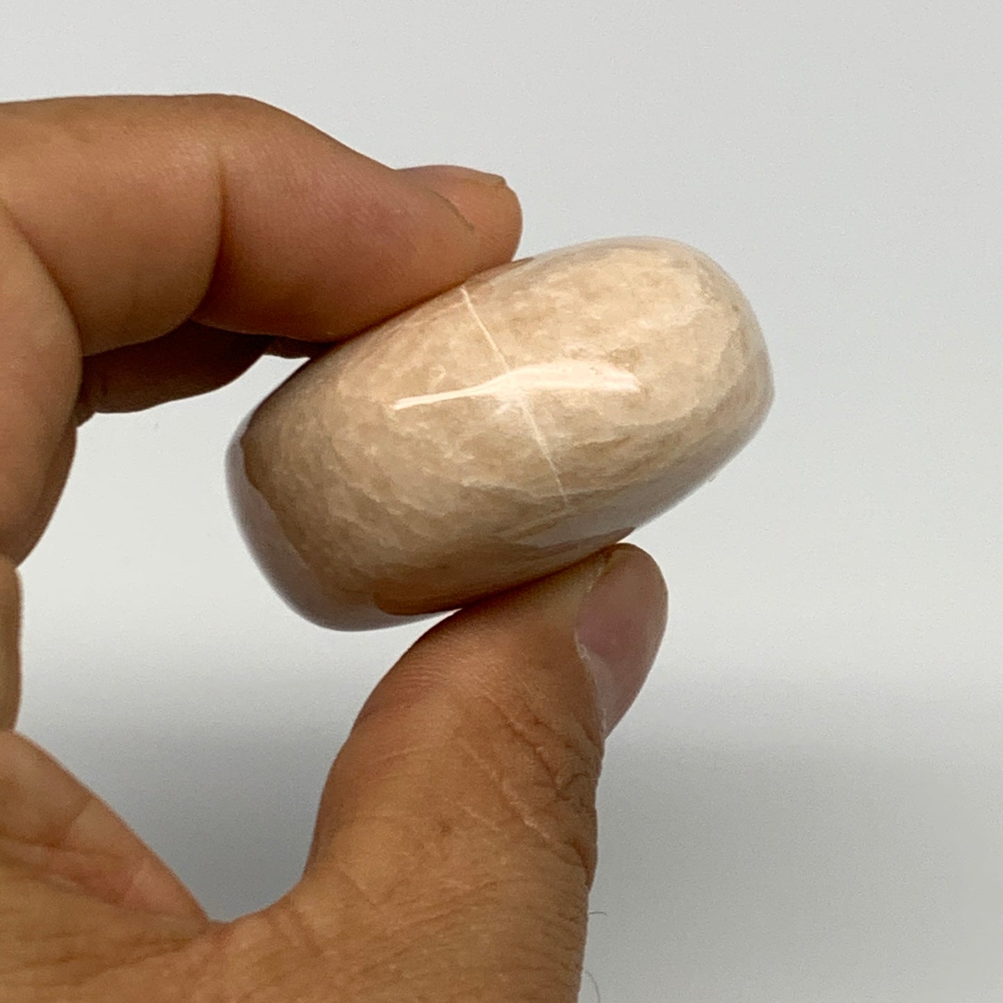 93.1g,2.2"x1.6"x0.9" Peach Moonstone Crystal Palm-Stone Polished Reiki, B27986