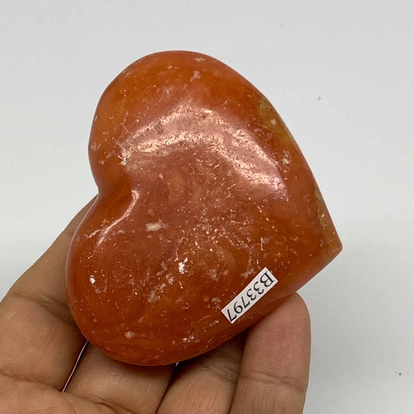 115.8g,2.3"x2.7"x0.9" Orange Calcite Heart Gemstones from Madagascar, B33797