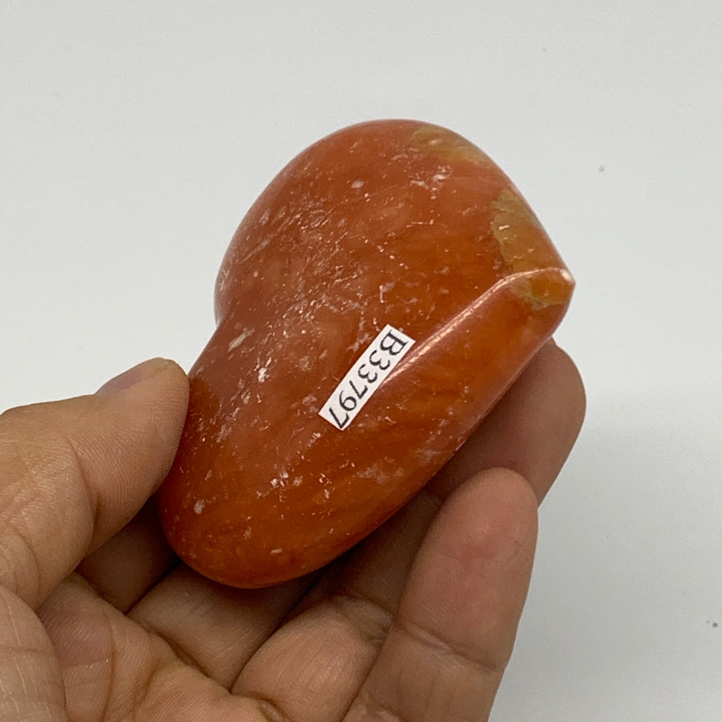 115.8g,2.3"x2.7"x0.9" Orange Calcite Heart Gemstones from Madagascar, B33797