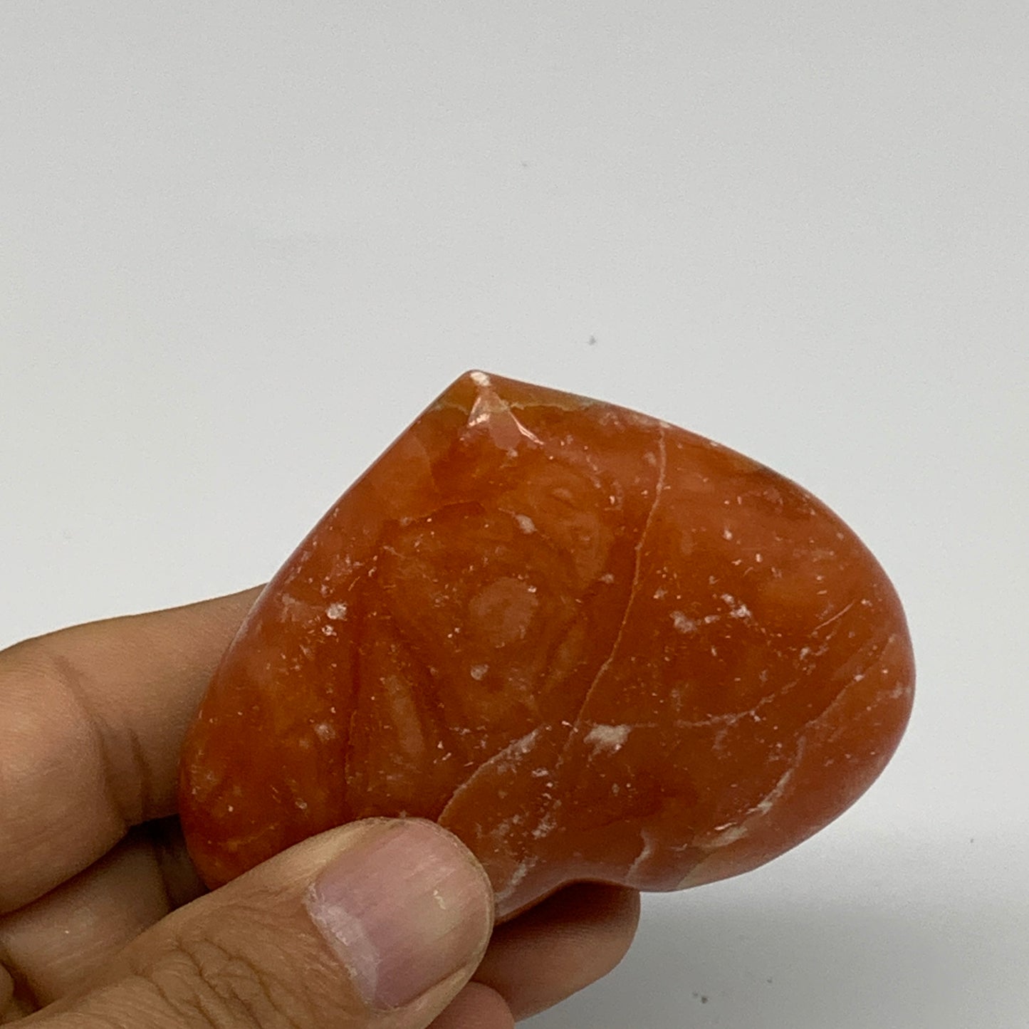 115.8g,2.3"x2.7"x0.9" Orange Calcite Heart Gemstones from Madagascar, B33797