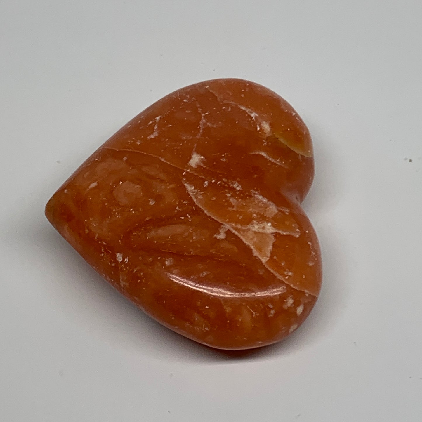 115.8g,2.3"x2.7"x0.9" Orange Calcite Heart Gemstones from Madagascar, B33797