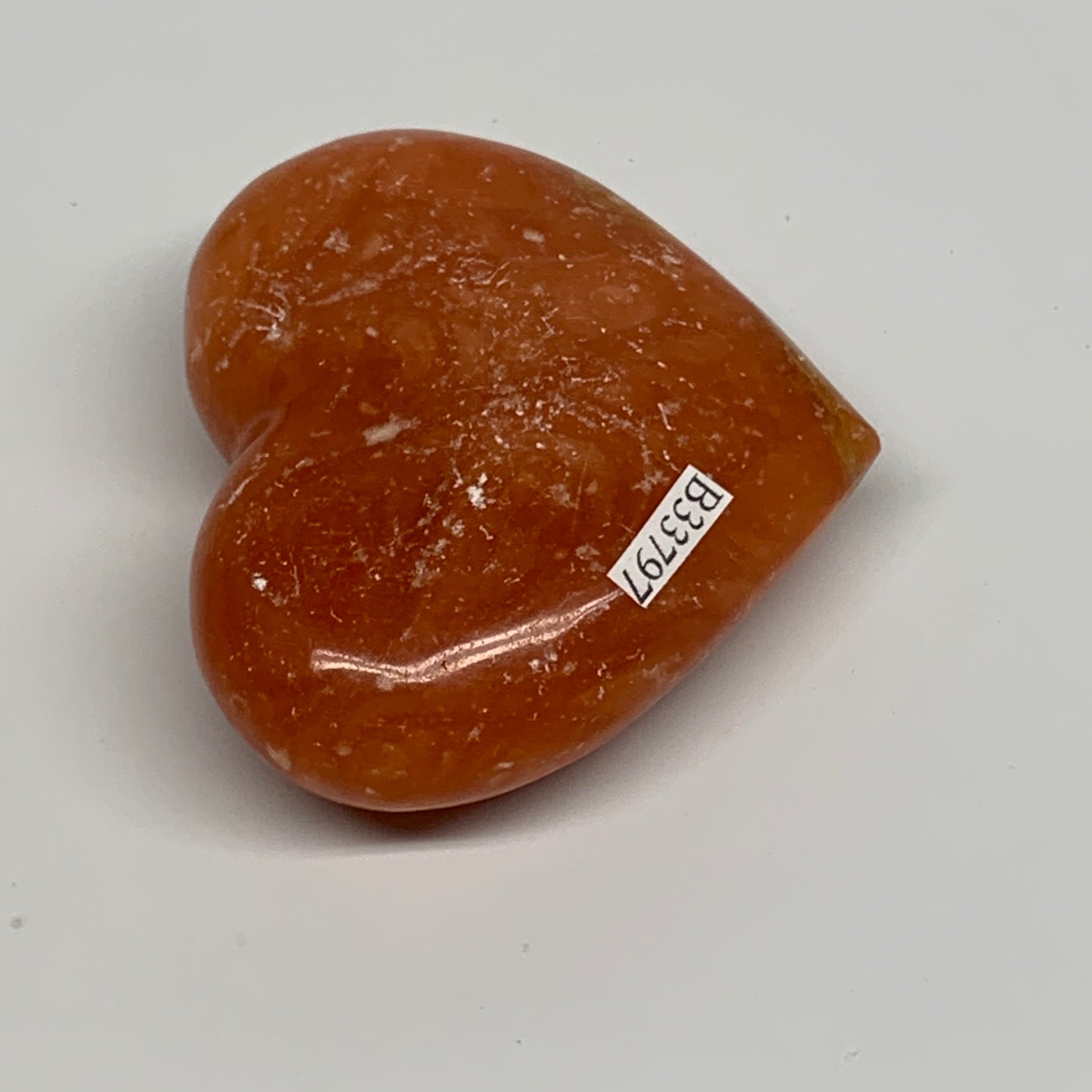 115.8g,2.3"x2.7"x0.9" Orange Calcite Heart Gemstones from Madagascar, B33797