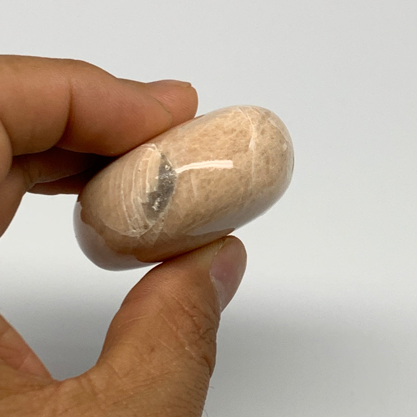 98.8g,2.3"x1.7"x0.9" Peach Moonstone Crystal Palm-Stone Polished Reiki, B27987