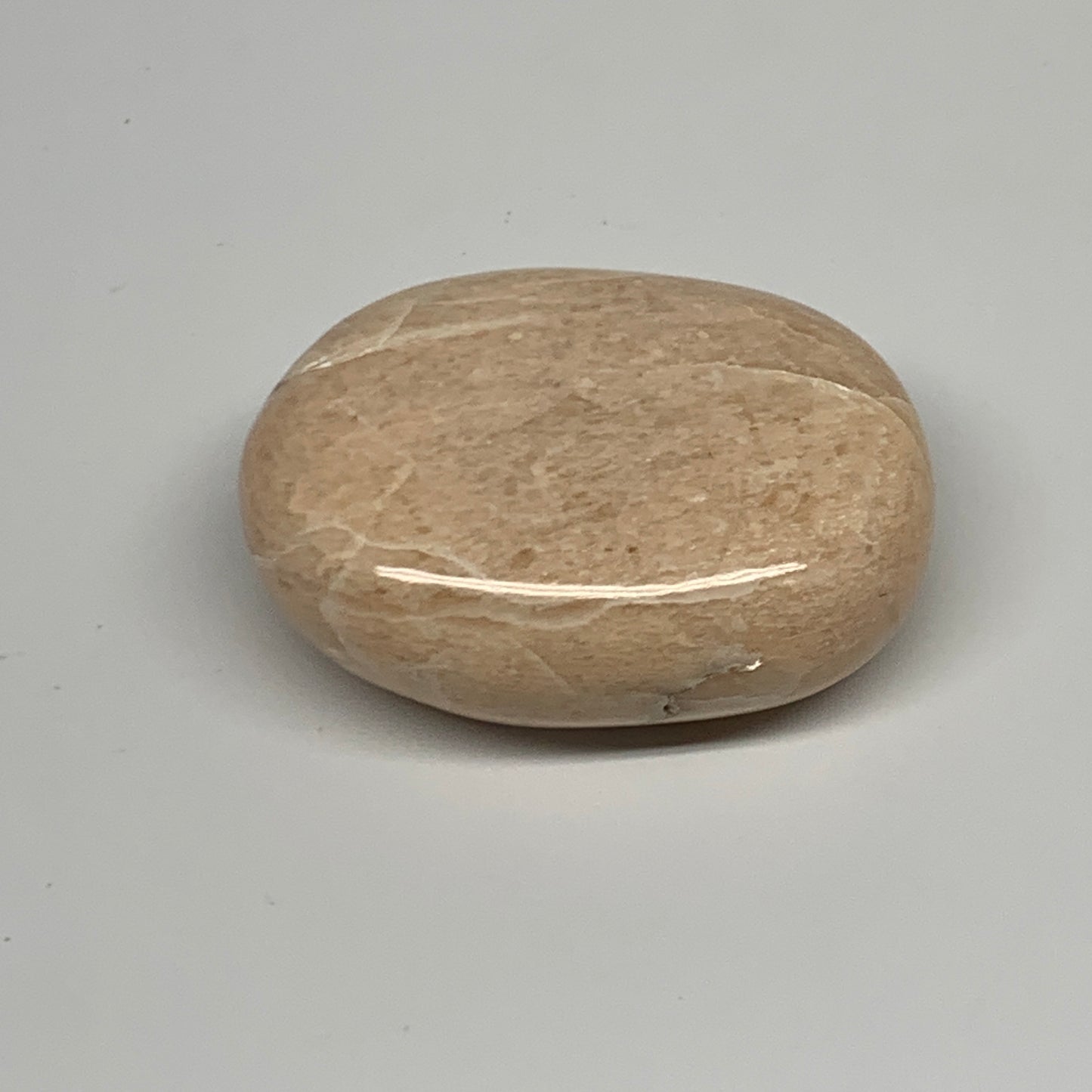 98.8g,2.3"x1.7"x0.9" Peach Moonstone Crystal Palm-Stone Polished Reiki, B27987