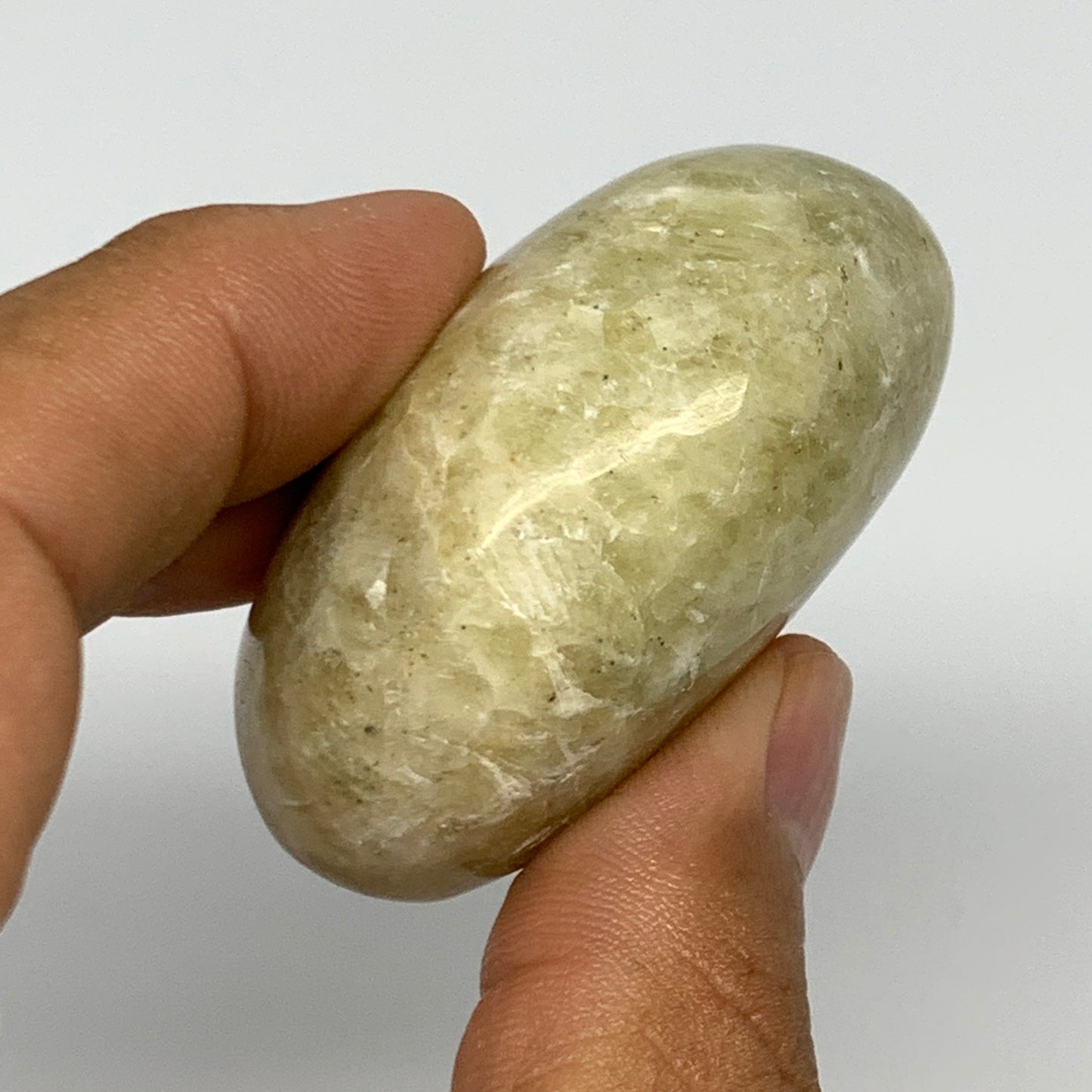 86g,2"x1.6"x1", Natural Yellow Calcite Palm-Stone Crystal Polished Reiki, B16843
