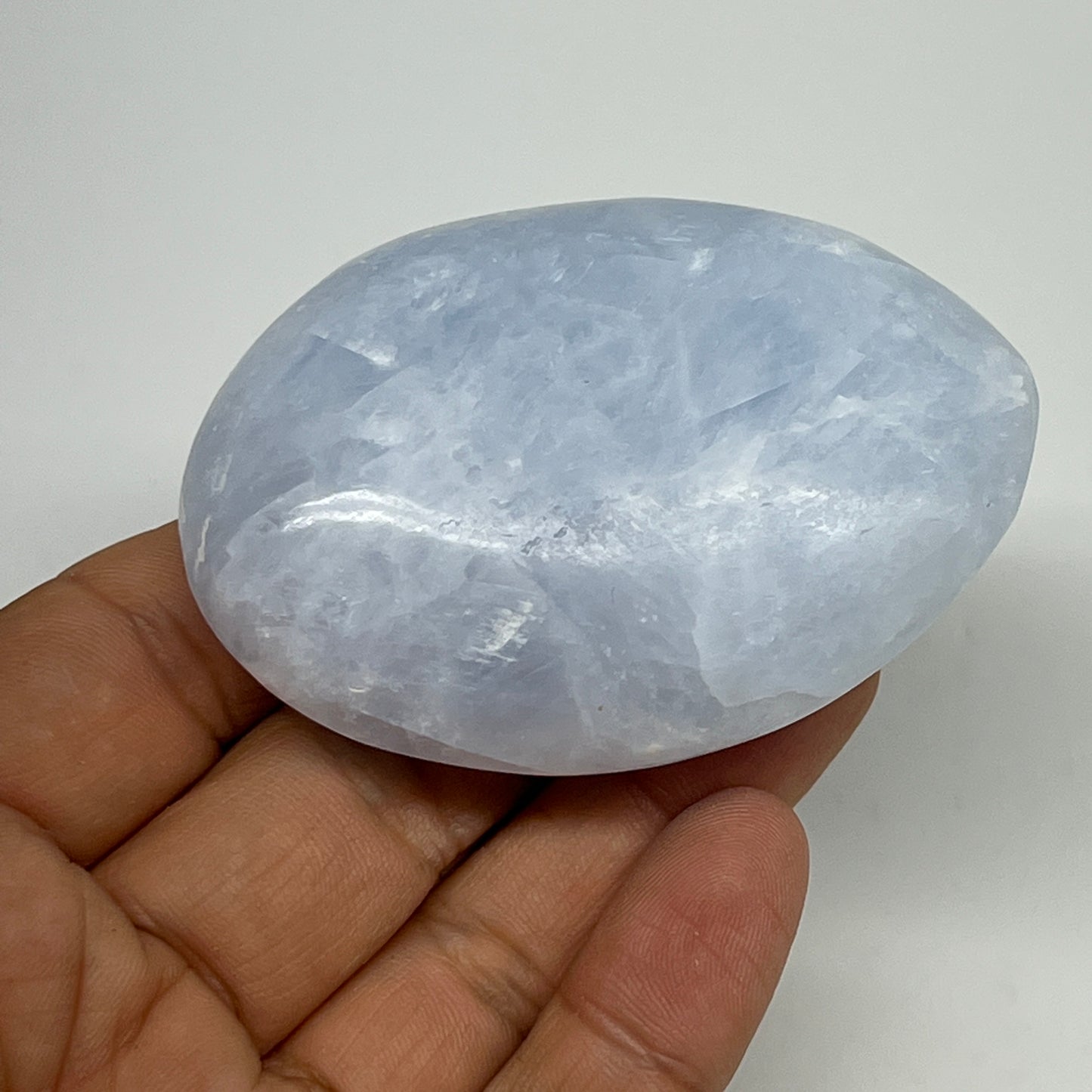 103.7g, 2.6"x1.9"x1" Blue Calcite Small Palm-Stone Tumbled @Madagascar, B20751
