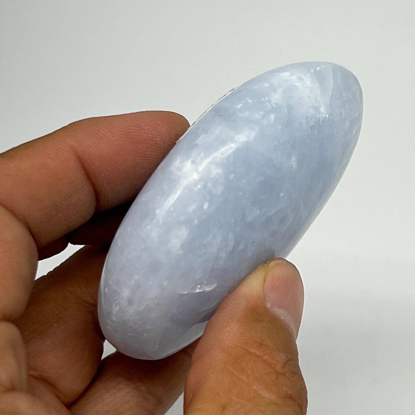 103.7g, 2.6"x1.9"x1" Blue Calcite Small Palm-Stone Tumbled @Madagascar, B20751