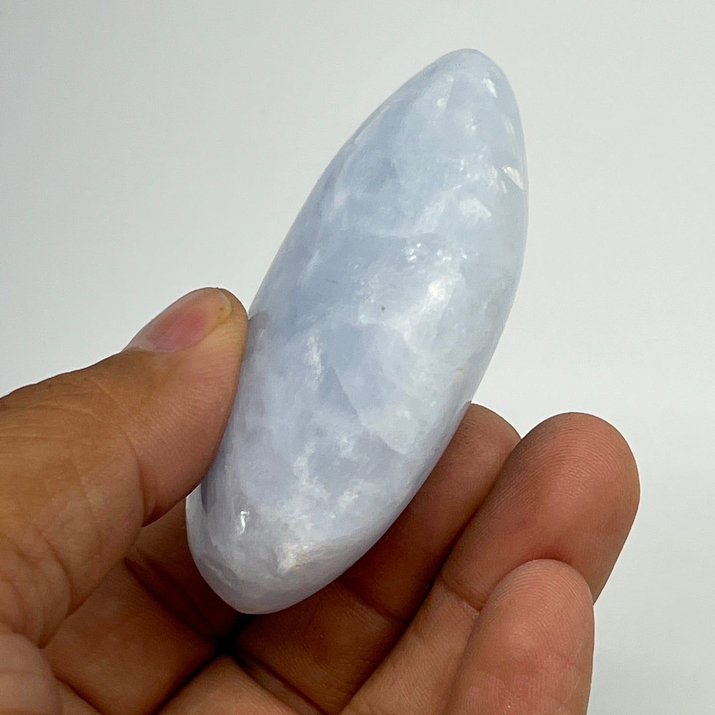 103.7g, 2.6"x1.9"x1" Blue Calcite Small Palm-Stone Tumbled @Madagascar, B20751