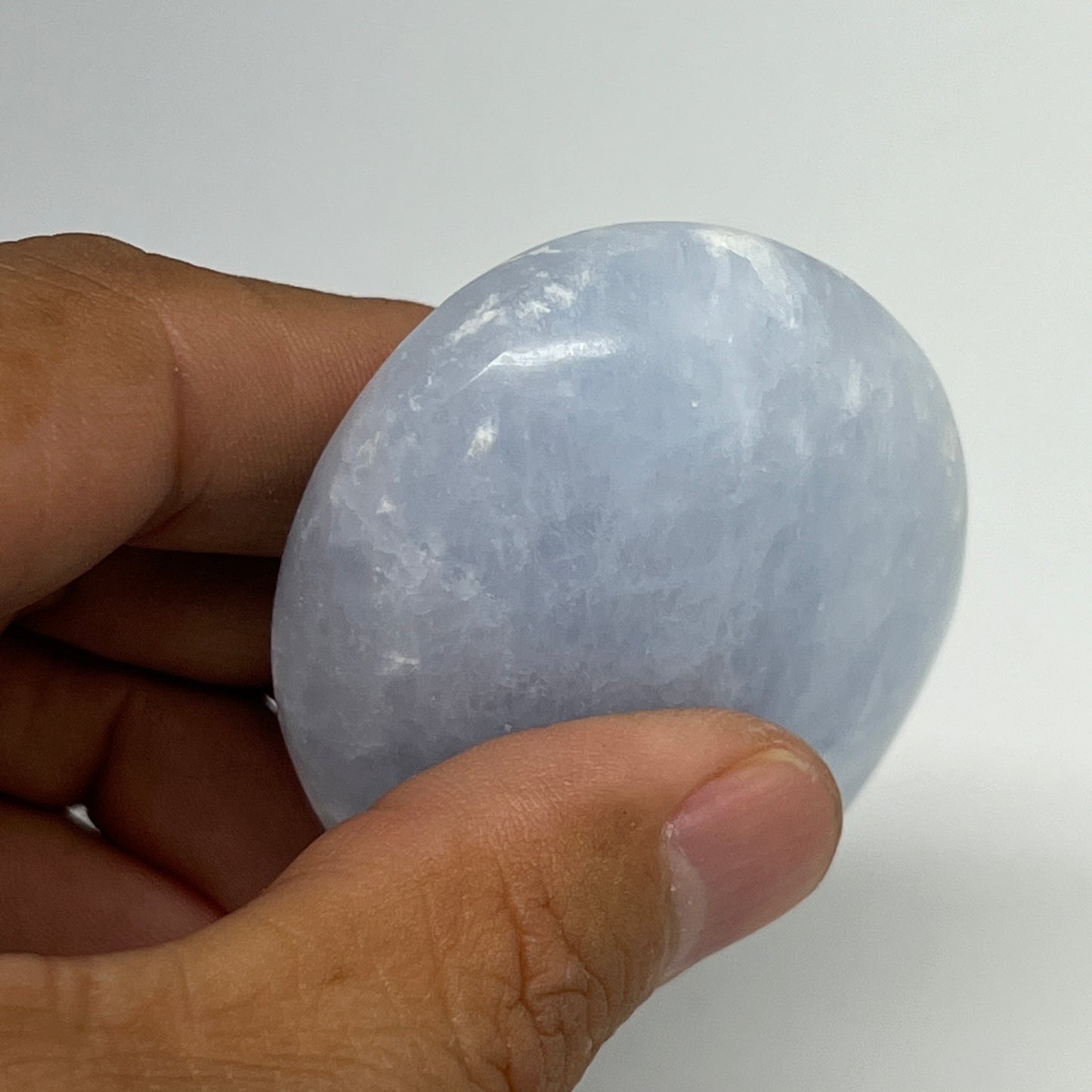 103.7g, 2.6"x1.9"x1" Blue Calcite Small Palm-Stone Tumbled @Madagascar, B20751