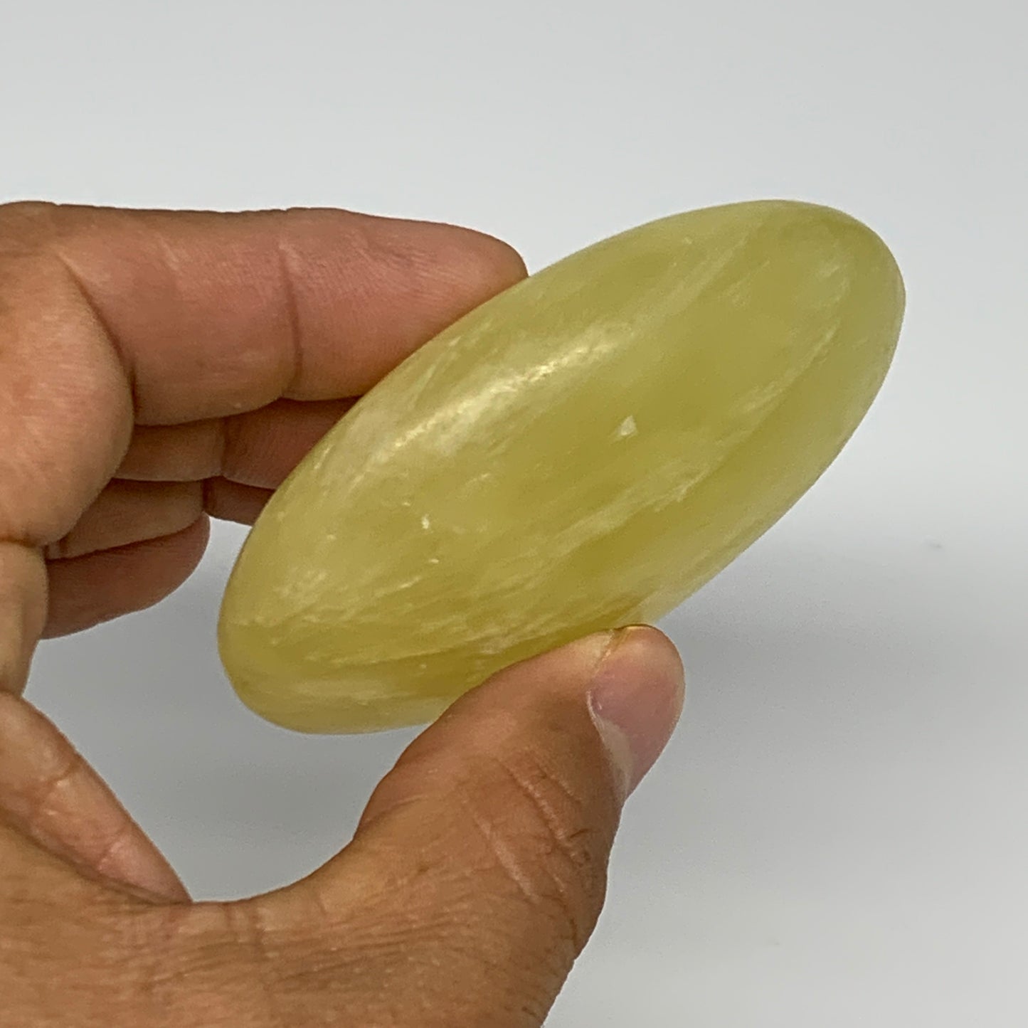 121.7g, 2.7"x1.9"x1", Lemon Calcite Palm-Stone Crystal Polished @Pakistan,B26403