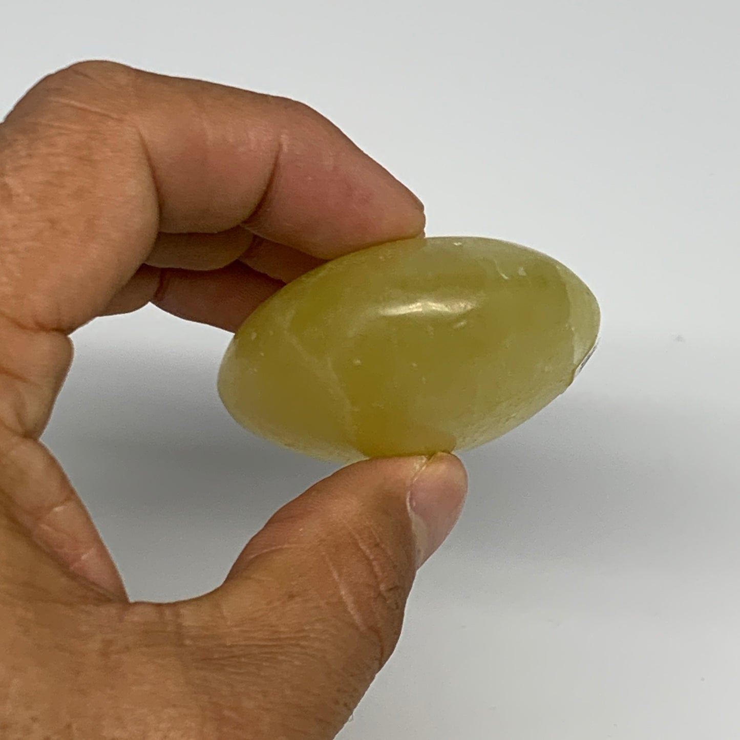 121.7g, 2.7"x1.9"x1", Lemon Calcite Palm-Stone Crystal Polished @Pakistan,B26403