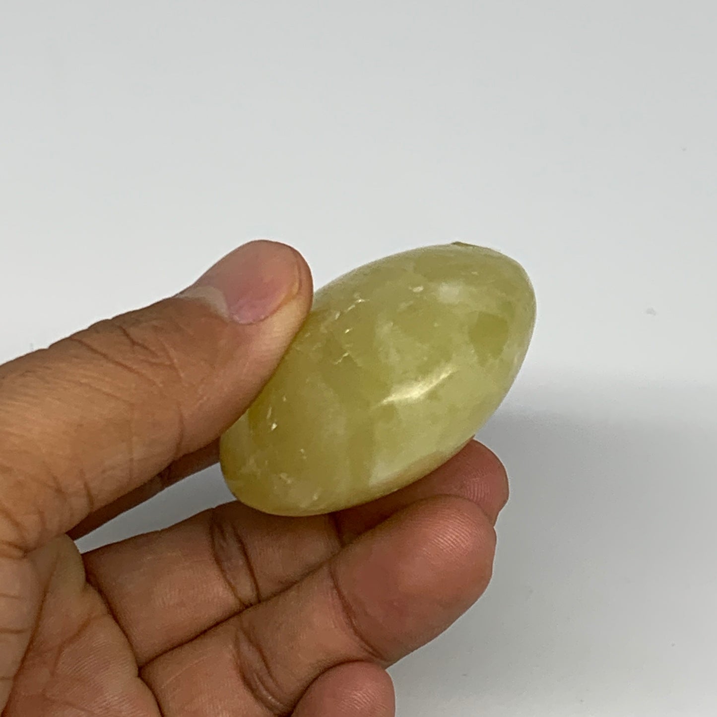 121.7g, 2.7"x1.9"x1", Lemon Calcite Palm-Stone Crystal Polished @Pakistan,B26403