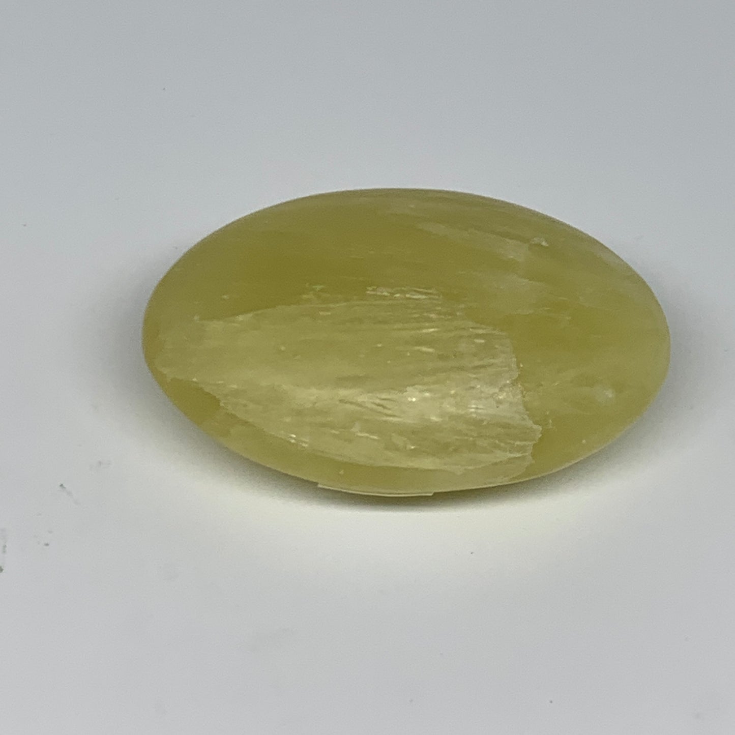 121.7g, 2.7"x1.9"x1", Lemon Calcite Palm-Stone Crystal Polished @Pakistan,B26403