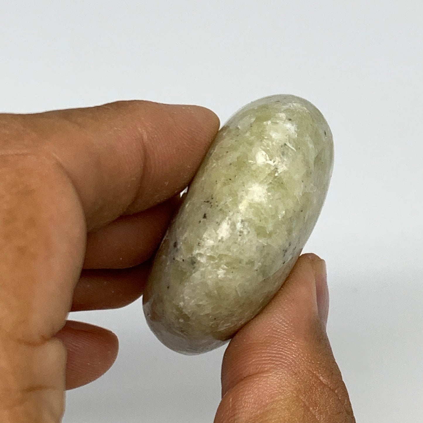 81.5g,2.2"x1.7"x0.8", Natural Yellow Calcite Palm-Stone Crystal Polished Reiki,