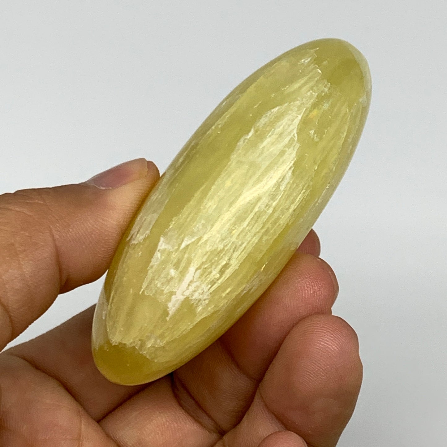 133g, 2.8"x1.8"x1", Lemon Calcite Palm-Stone Crystal Polished @Pakistan,B25510