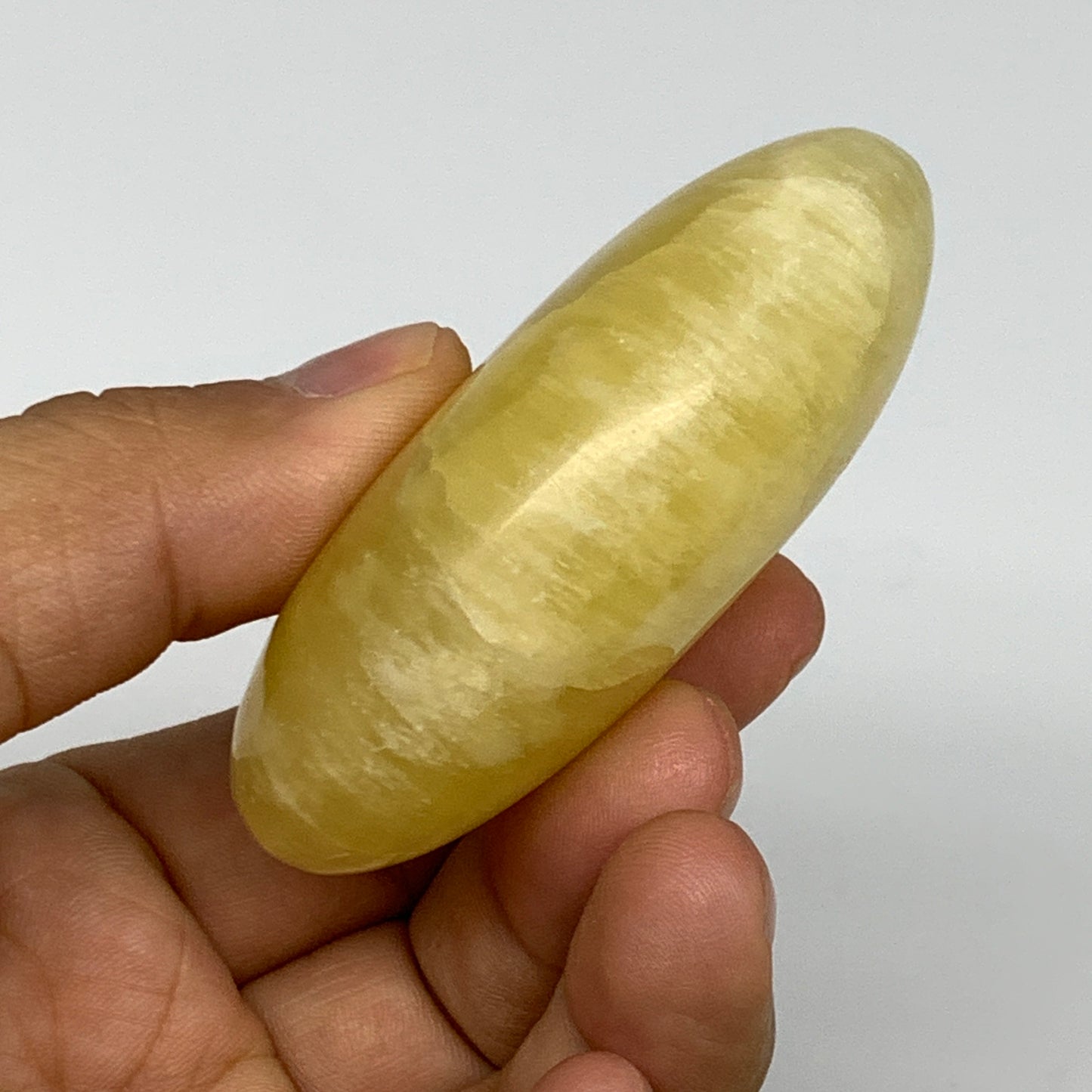 121.7g, 2.6"x1.9"x1", Lemon Calcite Palm-Stone Crystal Polished @Pakistan,B26412
