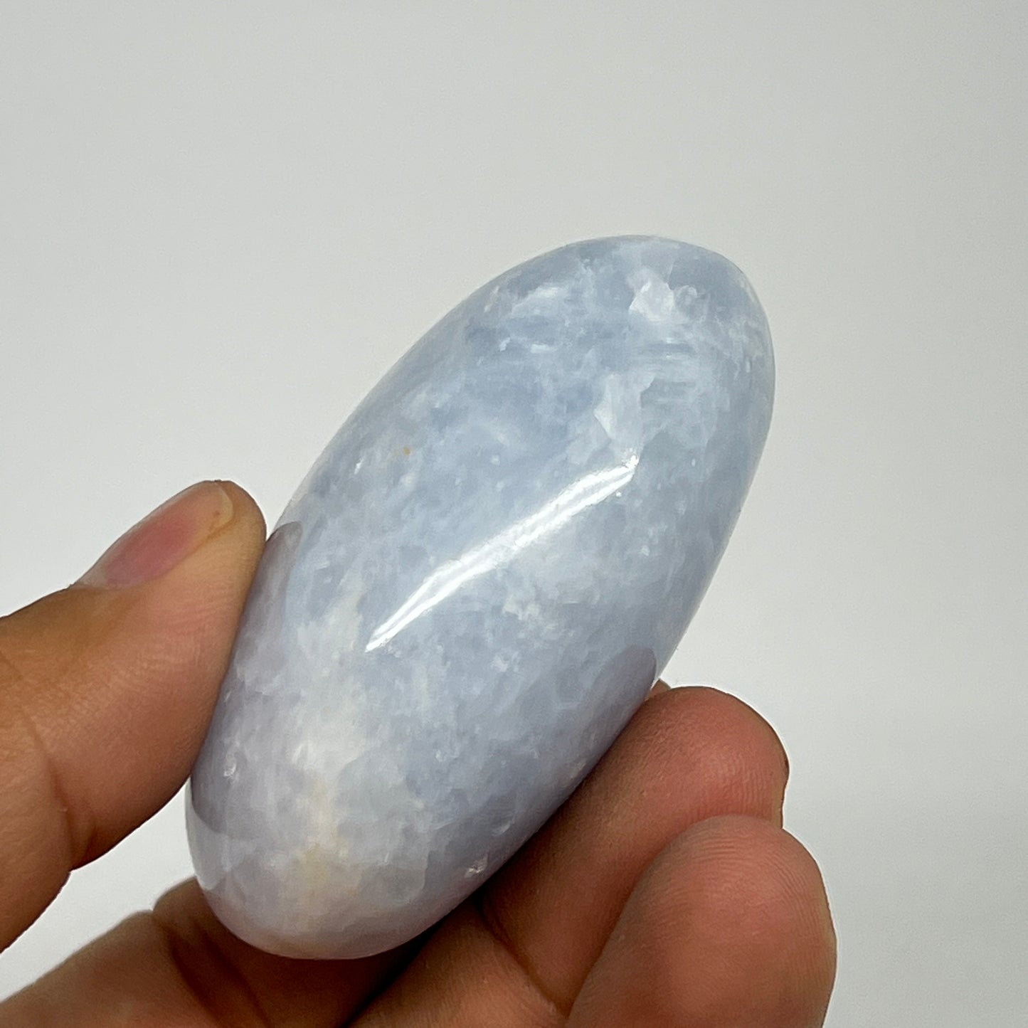 93.8g, 2.3"x1.6"x1.1" Blue Calcite Small Palm-Stone Tumbled @Madagascar, B20761