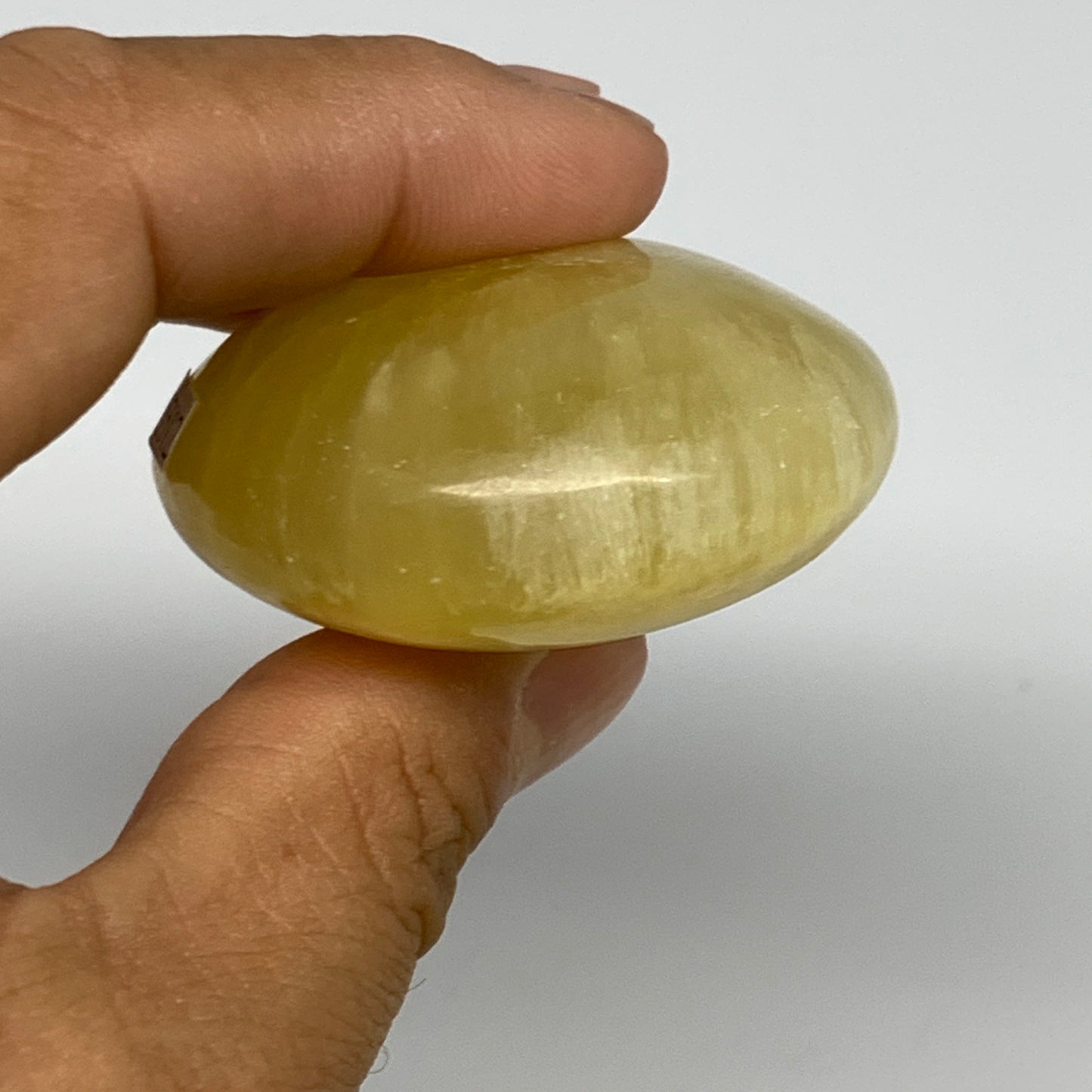 121.7g, 2.6"x1.9"x1", Lemon Calcite Palm-Stone Crystal Polished @Pakistan,B26412
