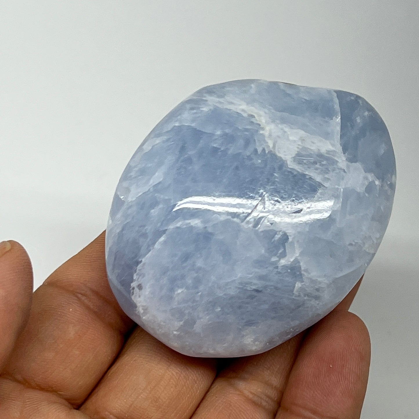 113.6g, 2.3"x1.9"x1.2" Blue Calcite Small Palm-Stone Tumbled @Madagascar, B20762