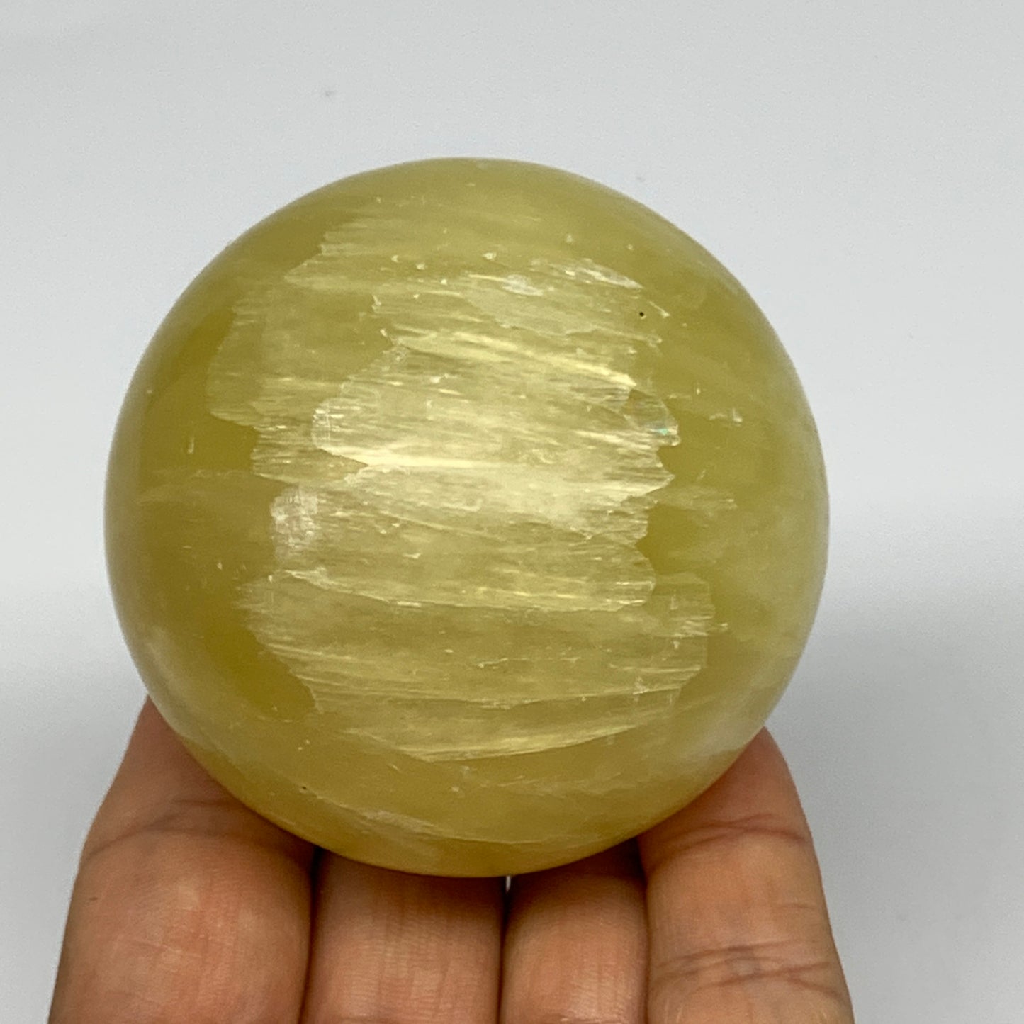 0.77 lbs,2.4"(61mm) Lemon Calcite Sphere Gemstone,Healing Crystal,B26057