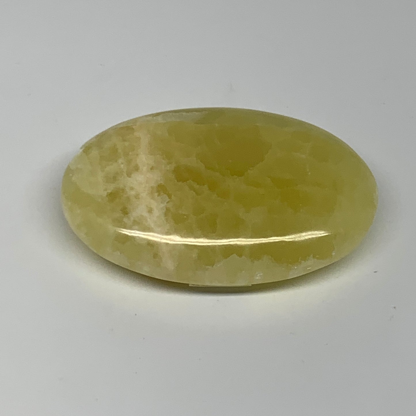 141.7g, 3.1"x2"x0.8", Lemon Calcite Palm-Stone Crystal Polished @Pakistan,B23355