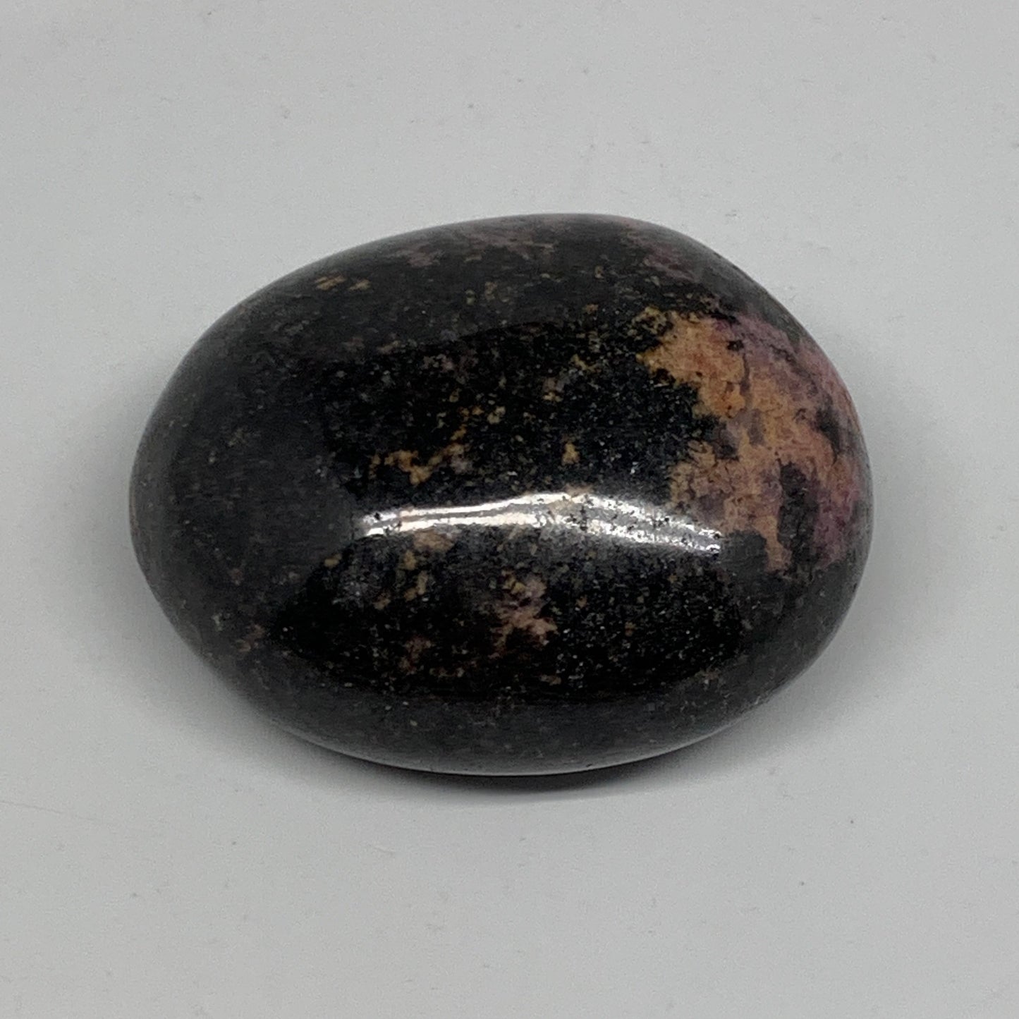 133.7g, 2.2"x1.8"x1.1", Rhodonite Palm-Stone Polished Reiki Madagascar,B12103