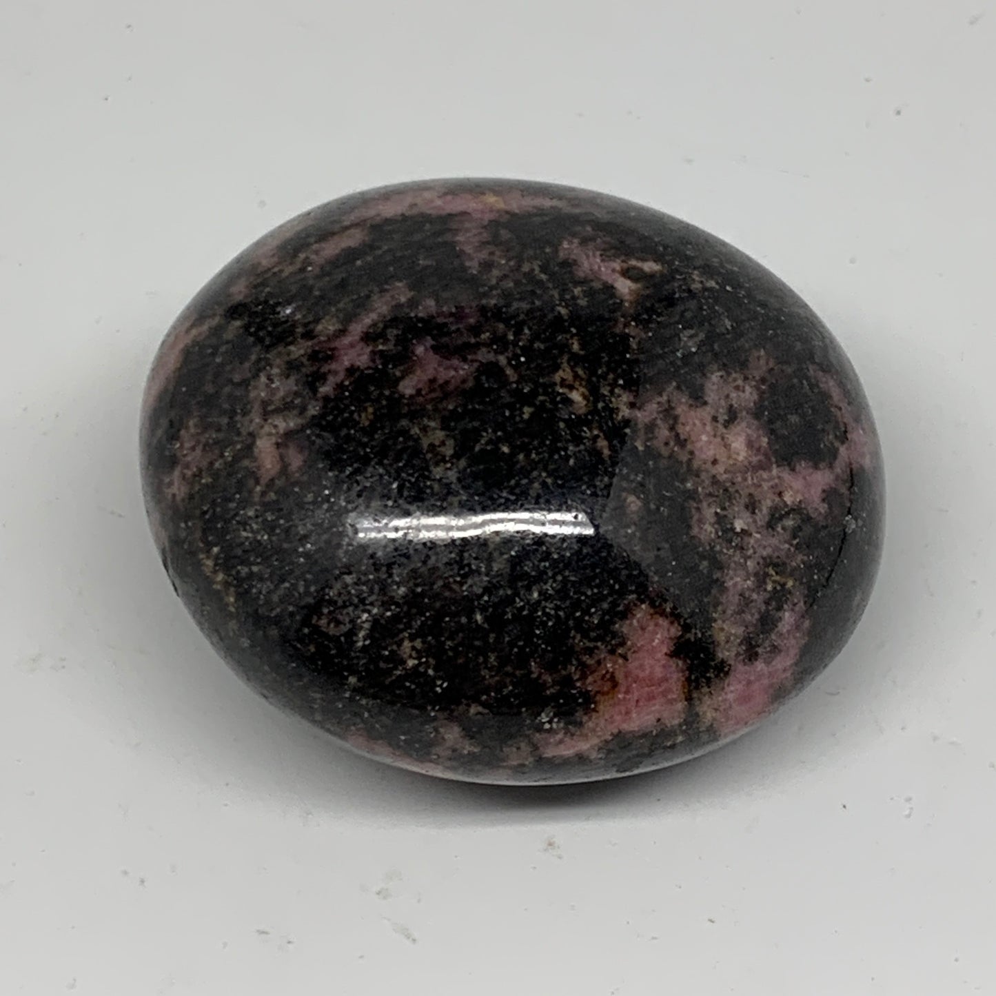 106.5g, 1.9"x1.7"x1.1", Rhodonite Palm-Stone Polished Reiki Madagascar,B12126