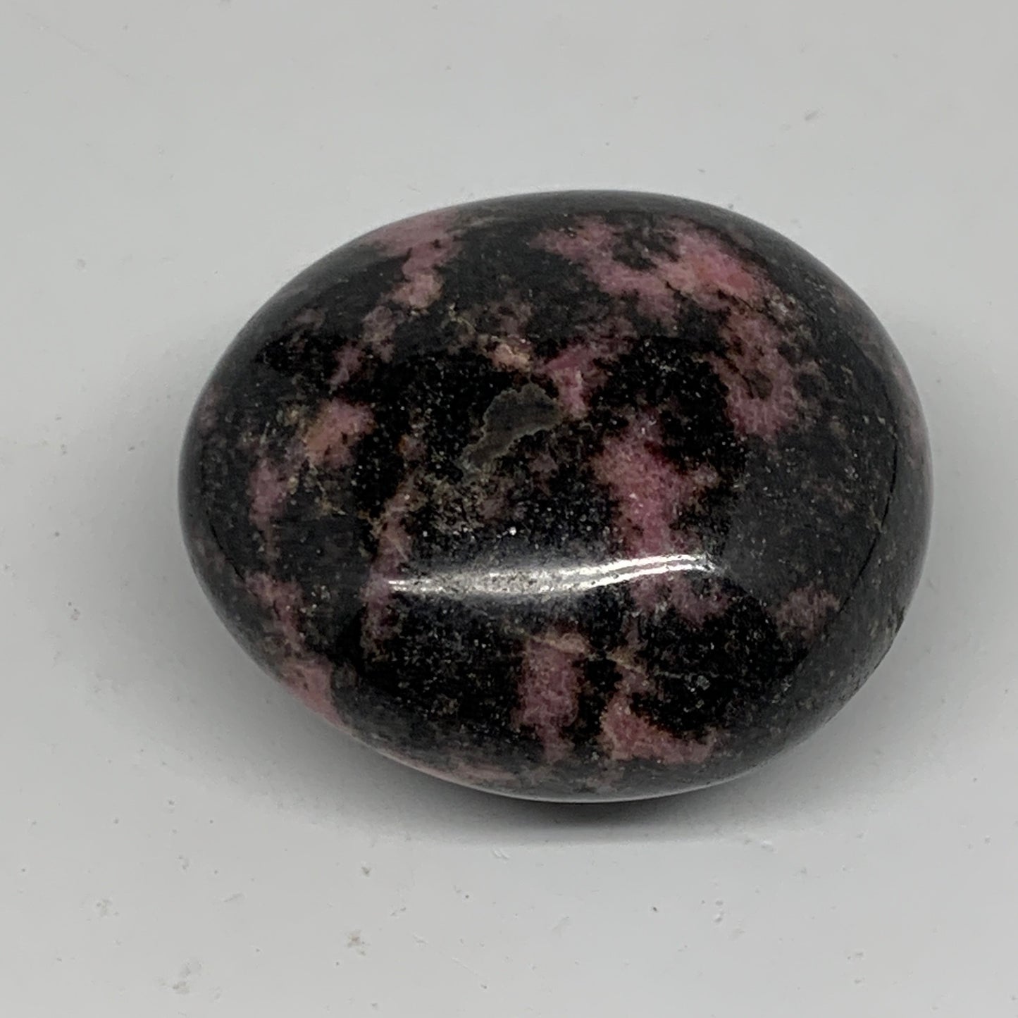 106.5g, 1.9"x1.7"x1.1", Rhodonite Palm-Stone Polished Reiki Madagascar,B12126