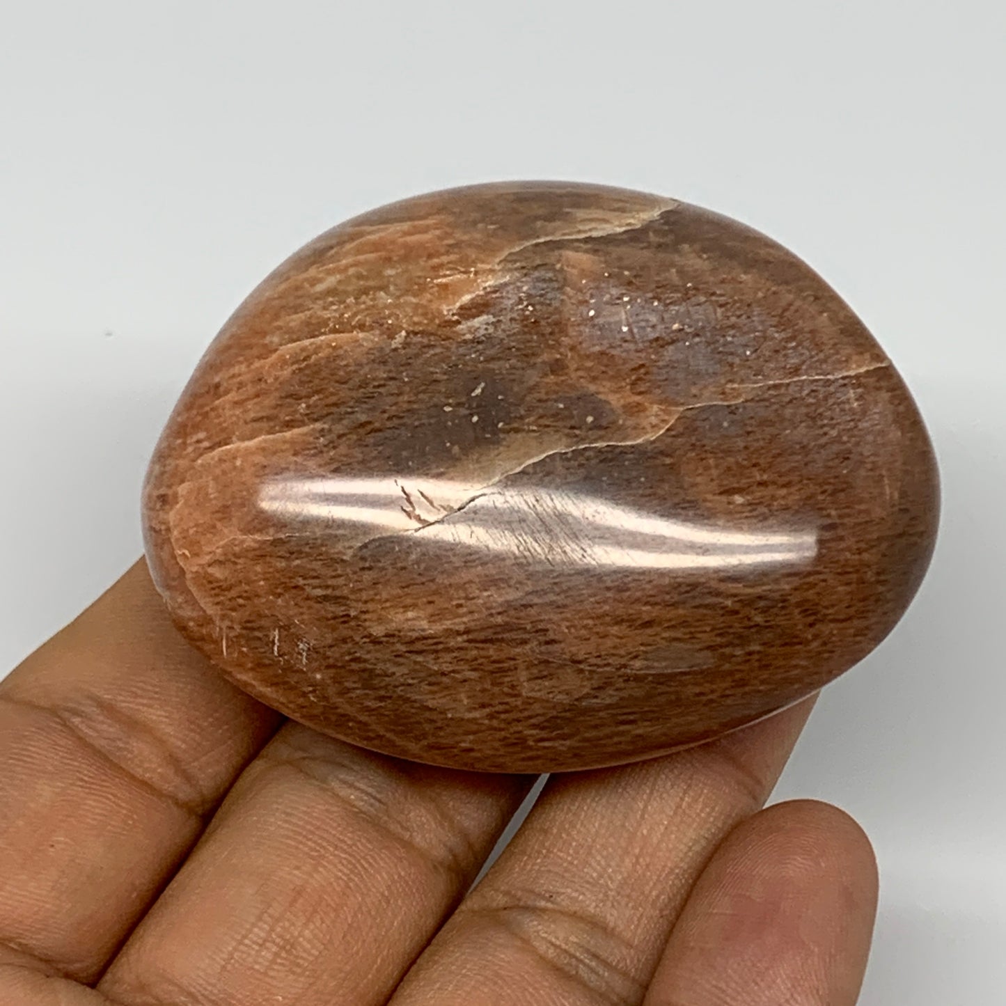98.5g,2.4"x1.9"x1", Peach Moonstone Palm-Stone Polished Reiki Crystal, B15484