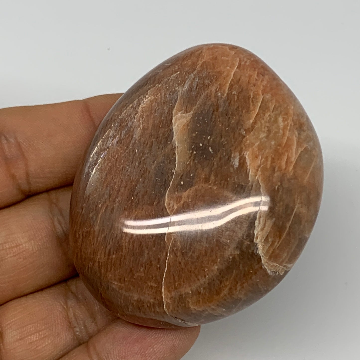 98.5g,2.4"x1.9"x1", Peach Moonstone Palm-Stone Polished Reiki Crystal, B15484