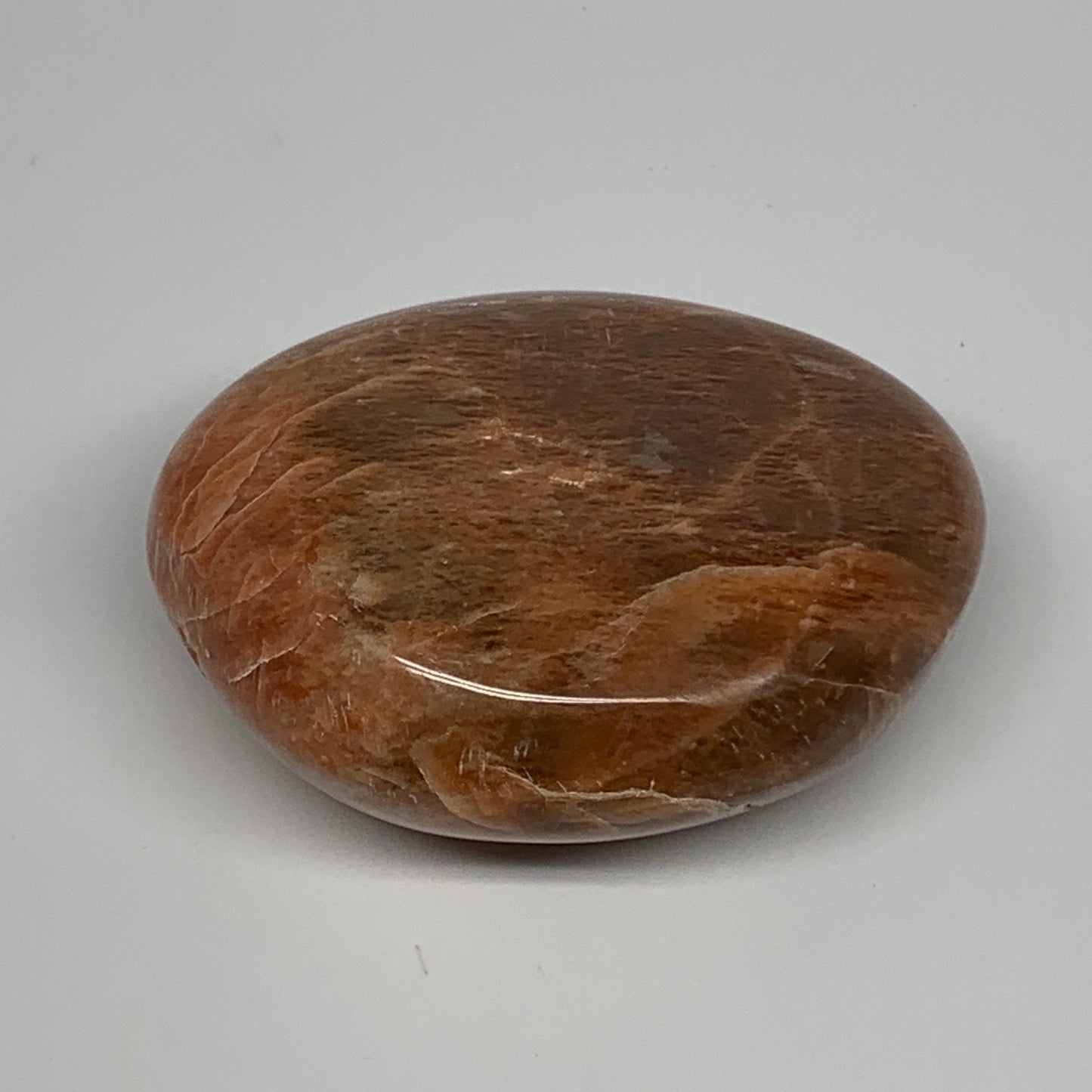 98.5g,2.4"x1.9"x1", Peach Moonstone Palm-Stone Polished Reiki Crystal, B15484