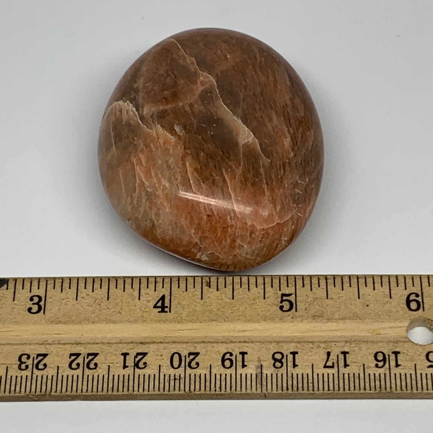 98.5g,2.4"x1.9"x1", Peach Moonstone Palm-Stone Polished Reiki Crystal, B15484