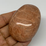 134.2g,2.7"x1.9"x1.1", Peach Moonstone Palm-Stone Polished Reiki Crystal, B15503