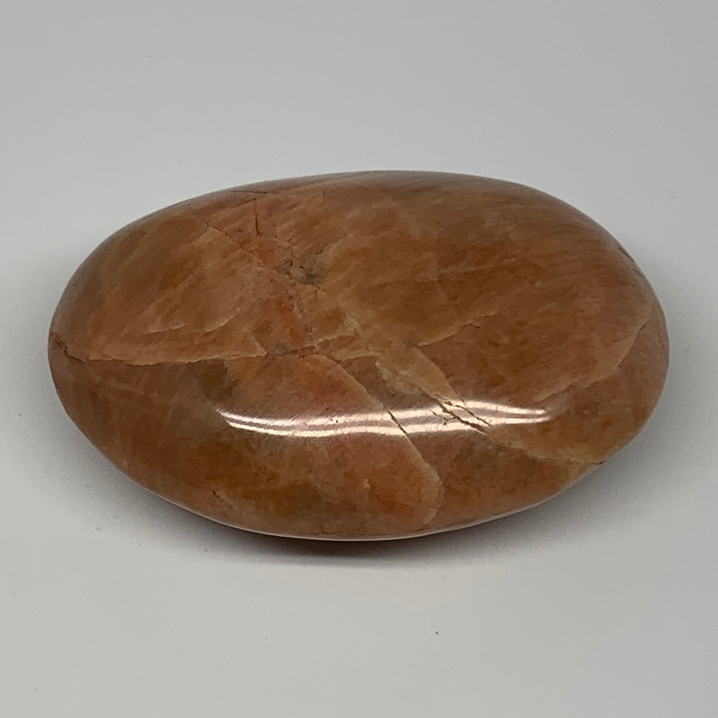 104.8g,2.7"x1.9"x1", Peach Moonstone Palm-Stone Polished Reiki Crystal, B15516