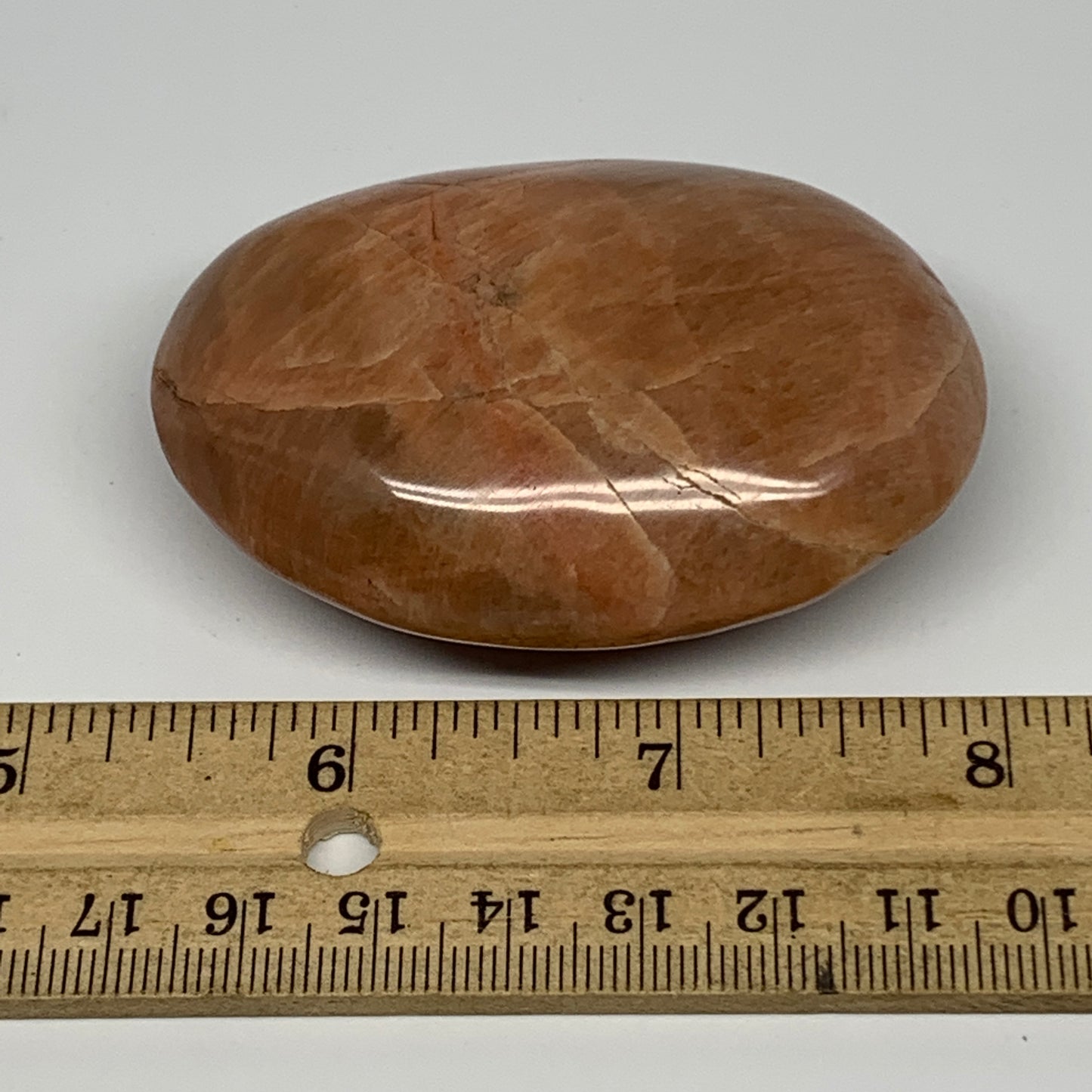 104.8g,2.7"x1.9"x1", Peach Moonstone Palm-Stone Polished Reiki Crystal, B15516