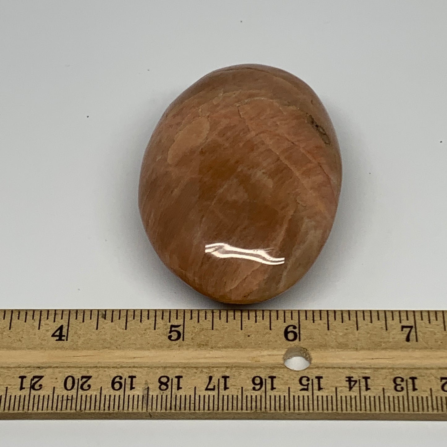 104.8g,2.7"x1.9"x1", Peach Moonstone Palm-Stone Polished Reiki Crystal, B15516