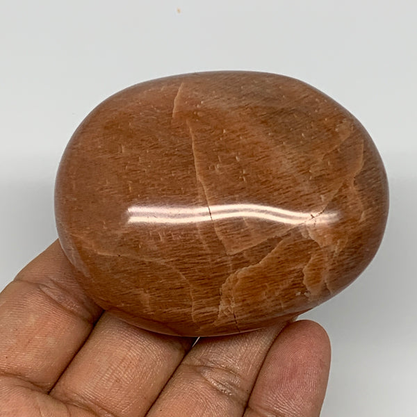 154g,2.7"x2.2"x1.1", Peach Moonstone Palm-Stone Polished Reiki Crystal, B15528