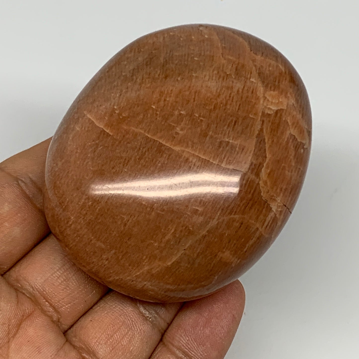 154g,2.7"x2.2"x1.1", Peach Moonstone Palm-Stone Polished Reiki Crystal, B15528