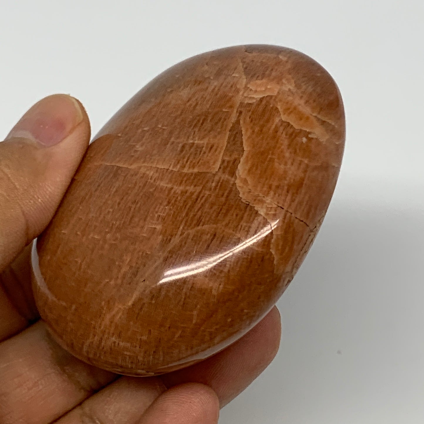 154g,2.7"x2.2"x1.1", Peach Moonstone Palm-Stone Polished Reiki Crystal, B15528