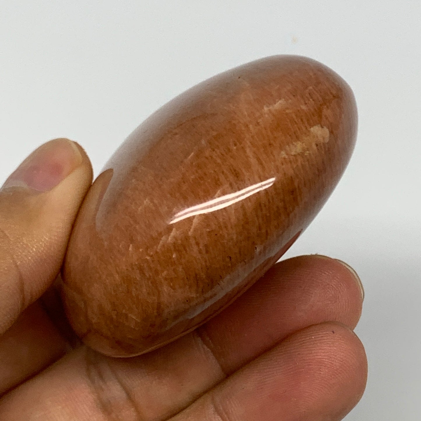 154g,2.7"x2.2"x1.1", Peach Moonstone Palm-Stone Polished Reiki Crystal, B15528