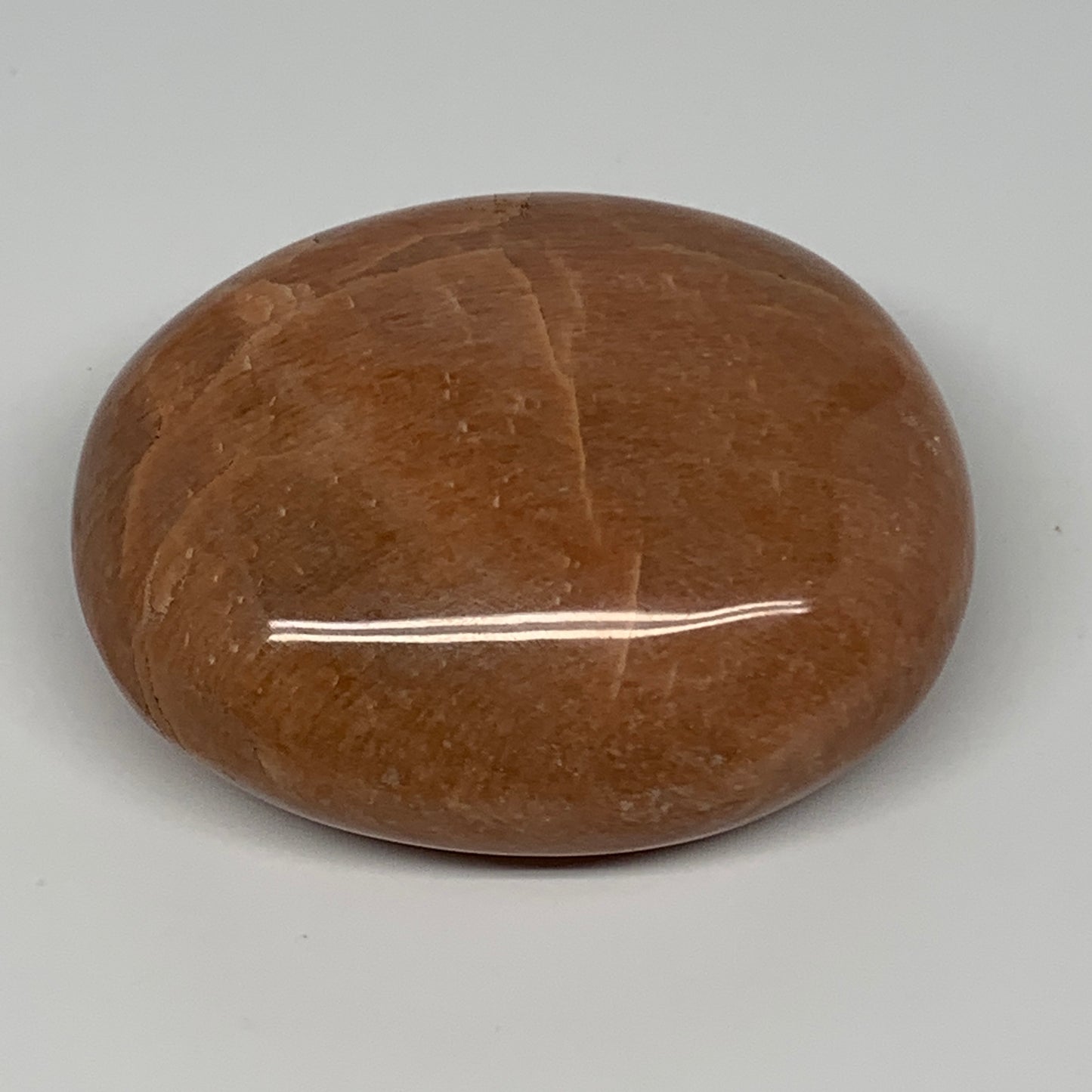 154g,2.7"x2.2"x1.1", Peach Moonstone Palm-Stone Polished Reiki Crystal, B15528