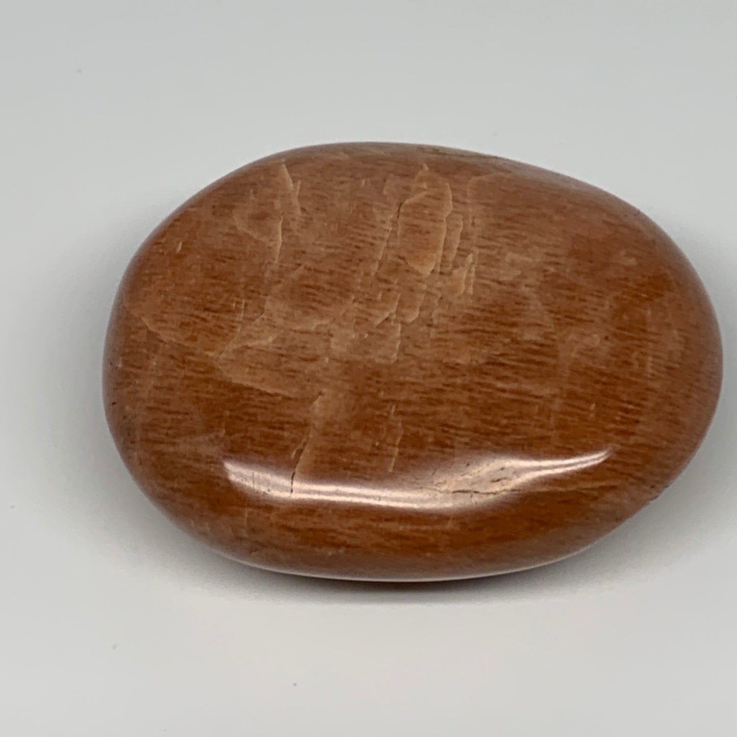 154g,2.7"x2.2"x1.1", Peach Moonstone Palm-Stone Polished Reiki Crystal, B15528