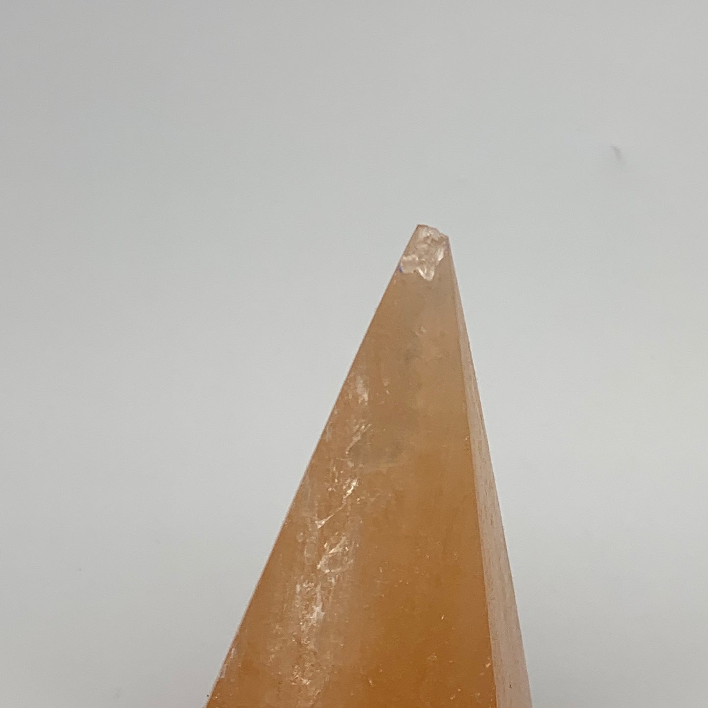 250g, 3.8"x2"  Orange Selenite/Satin Spar Pyramid Crystal @Morocco, B24237