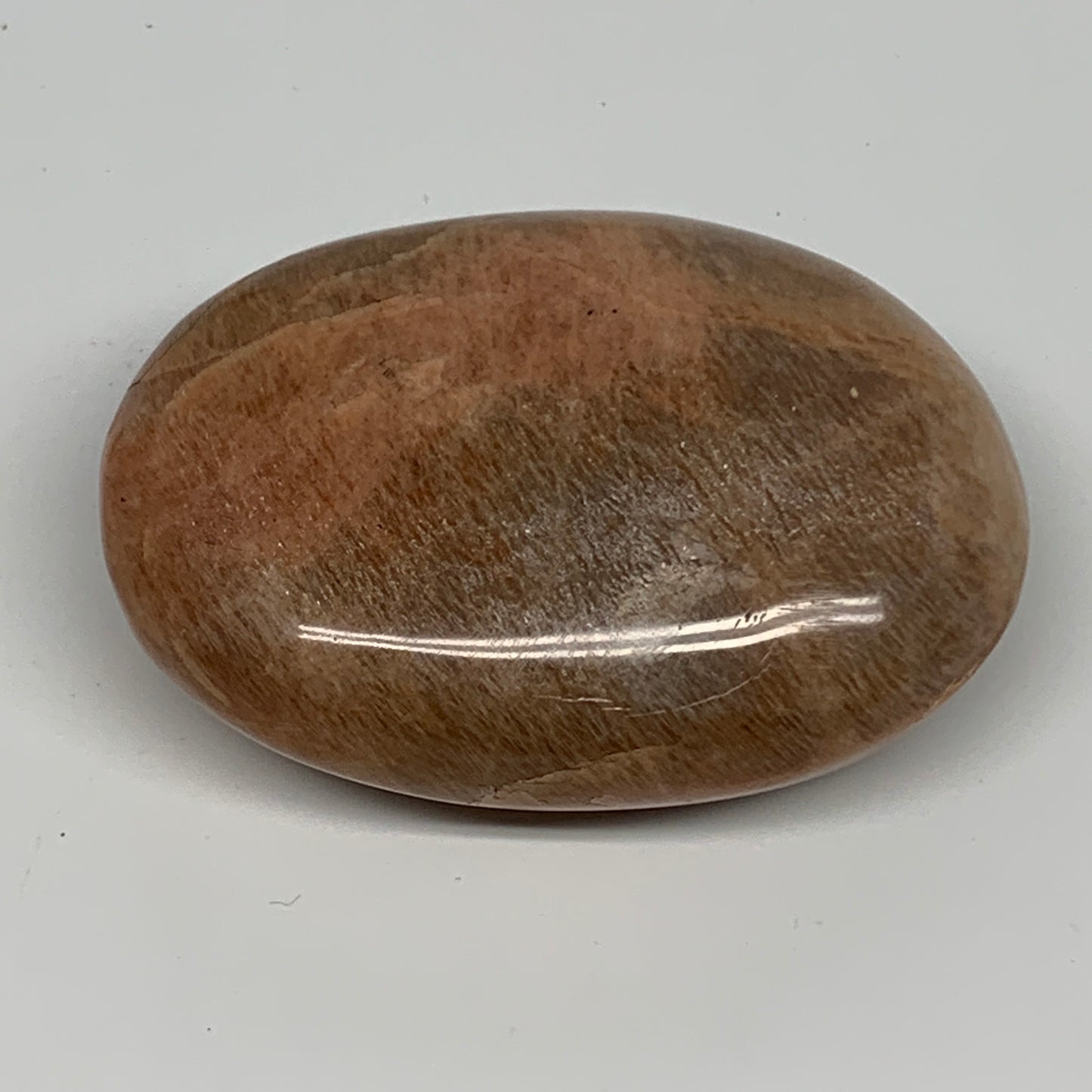 111.3g,2.6"x1.9"x1", Peach Moonstone Palm-Stone Polished Reiki Crystal, B15541