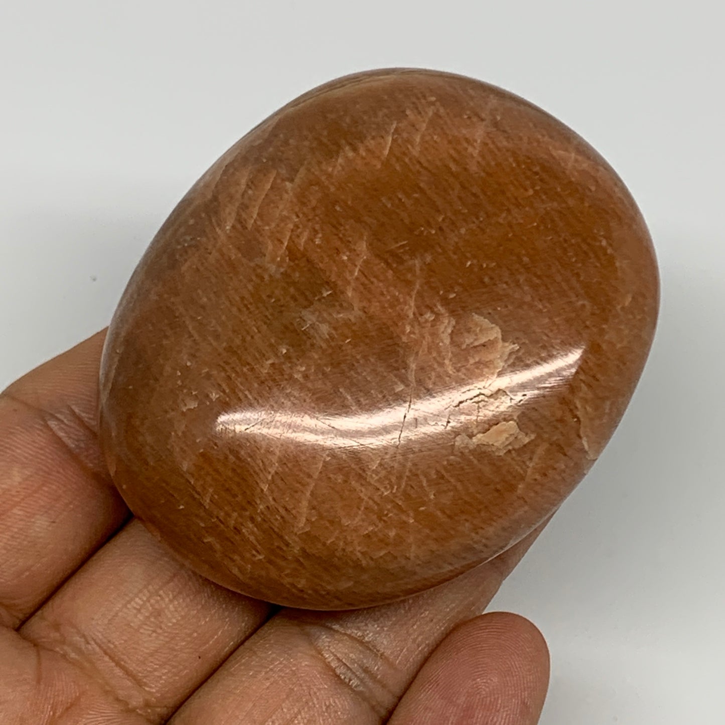 129.1g,2.4"x2.1"x1.1", Peach Moonstone Palm-Stone Polished Reiki Crystal, B15544