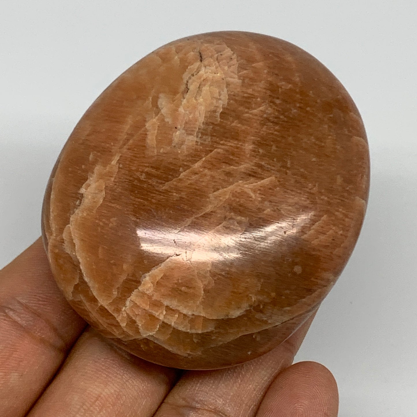 129.1g,2.4"x2.1"x1.1", Peach Moonstone Palm-Stone Polished Reiki Crystal, B15544