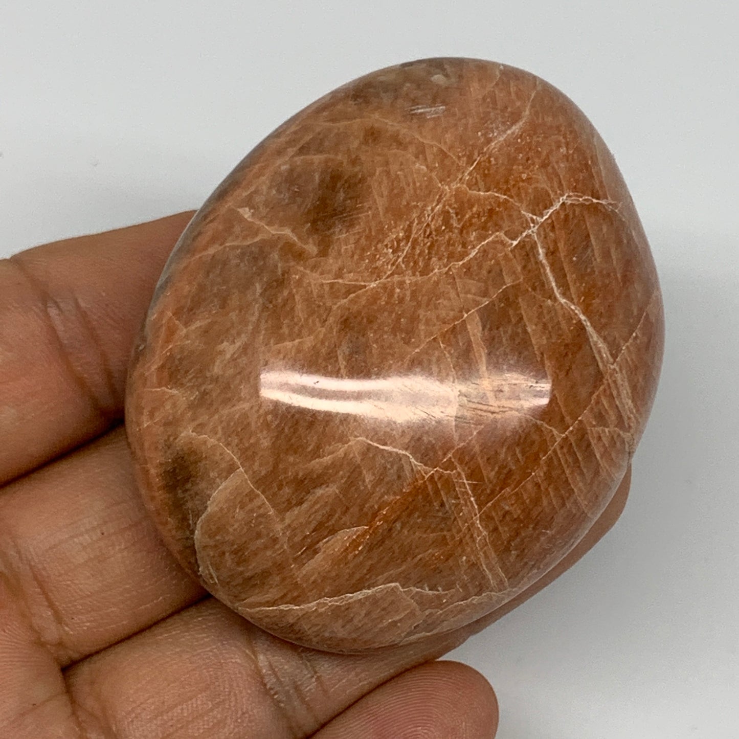 110.2g,2.3"x1.9"x1.1", Peach Moonstone Palm-Stone Polished Reiki Crystal, B15551