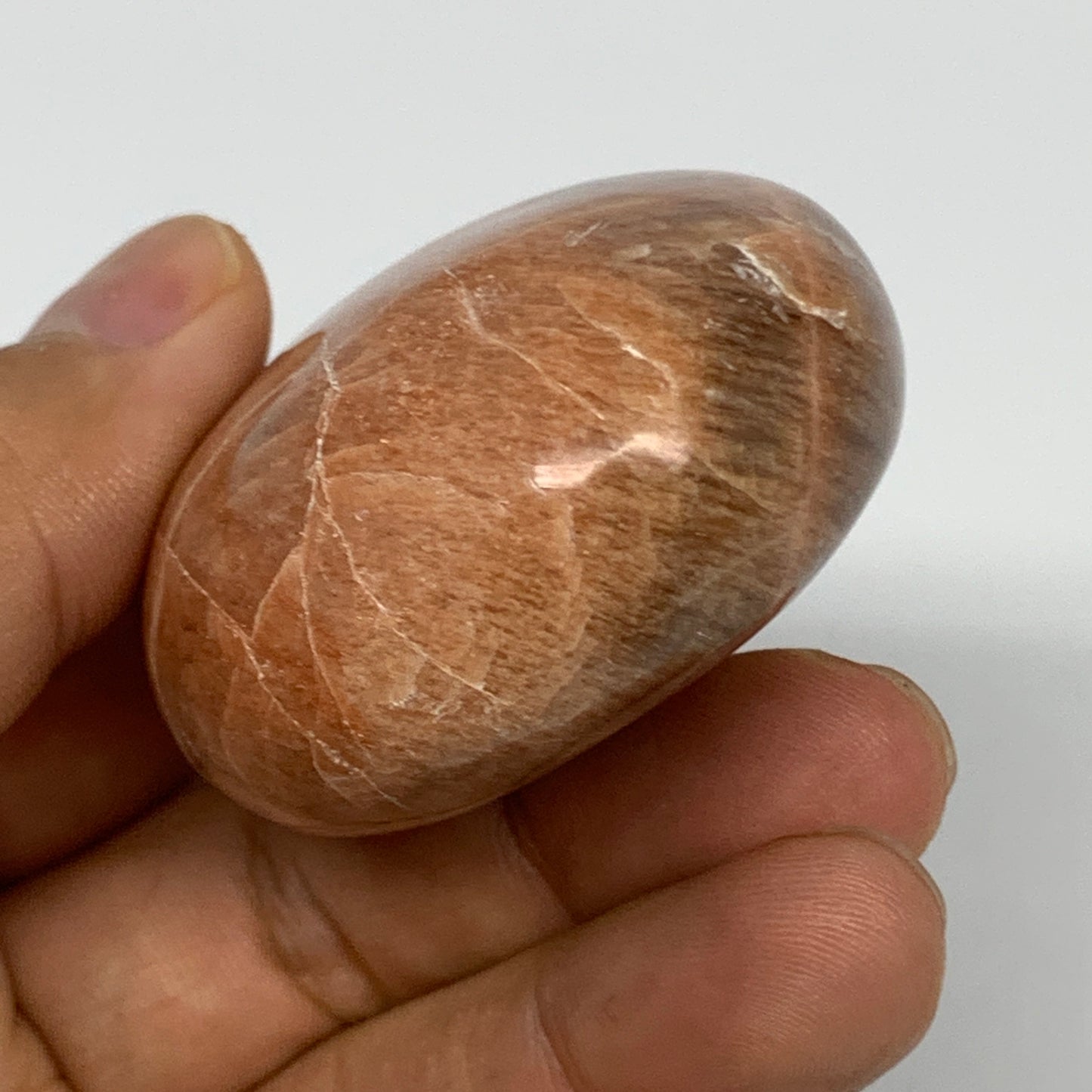 110.2g,2.3"x1.9"x1.1", Peach Moonstone Palm-Stone Polished Reiki Crystal, B15551