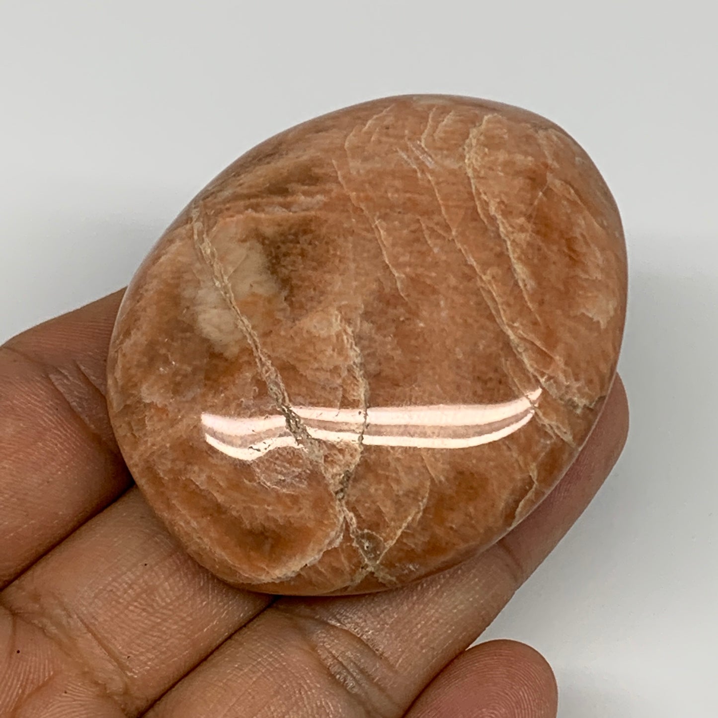 79g,2.2"x1.8"x0.9", Peach Moonstone Palm-Stone Polished Reiki Crystal, B15552