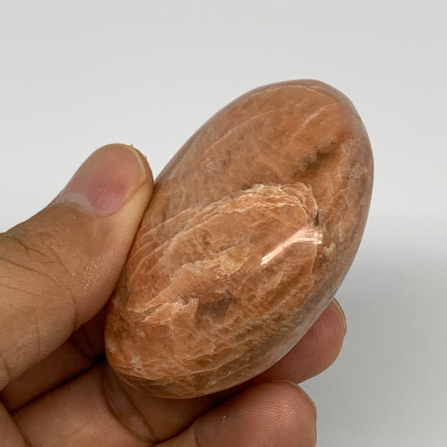 79g,2.2"x1.8"x0.9", Peach Moonstone Palm-Stone Polished Reiki Crystal, B15552